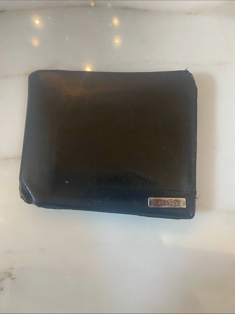 Prada Black Men’s Bifold Wallet with Metal Logo Plaque
